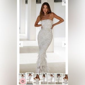 Amelia white dress Anne Louise Boutique White maxi dress with feathers
